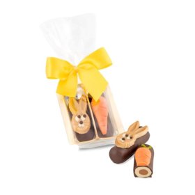 Geschenkartikel / Präsentartikel: Kleines Oster-Duo - zwei Marzipan-Nougat-Röllchen, auch in individ. Kissenverpackung