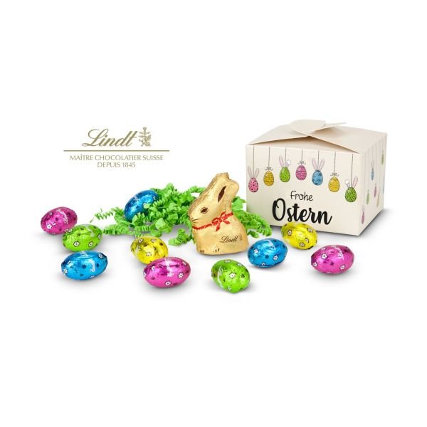 Geschenkartikel / Präsentartikel: Buntes Lindt Osternest - Lindt-Osterhase mit 8 Eiern, auch in individueller Pralinenschachtel